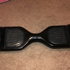 Hover board has few scratches and a vans sticker